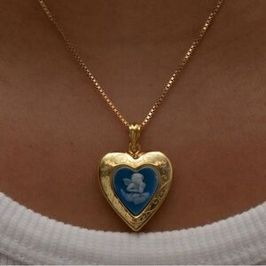 M Jewelers blue cherub heart locket necklace